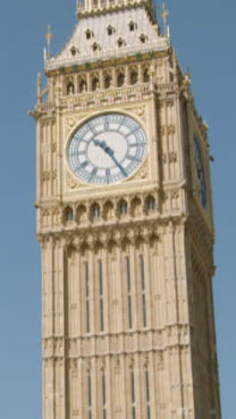 Vertical-Video-Tower-Clock-Of-Big-Ben-Against-Clear-Blue-Sky-London-UK